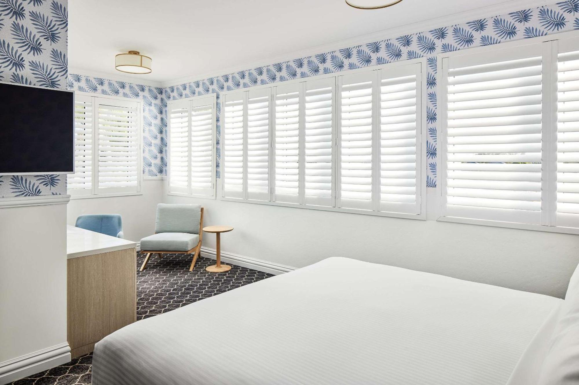 The Beachcomber Hotel & Resort, Ascend Hotel Collection Токли Экстерьер фото A bedroom with shutters