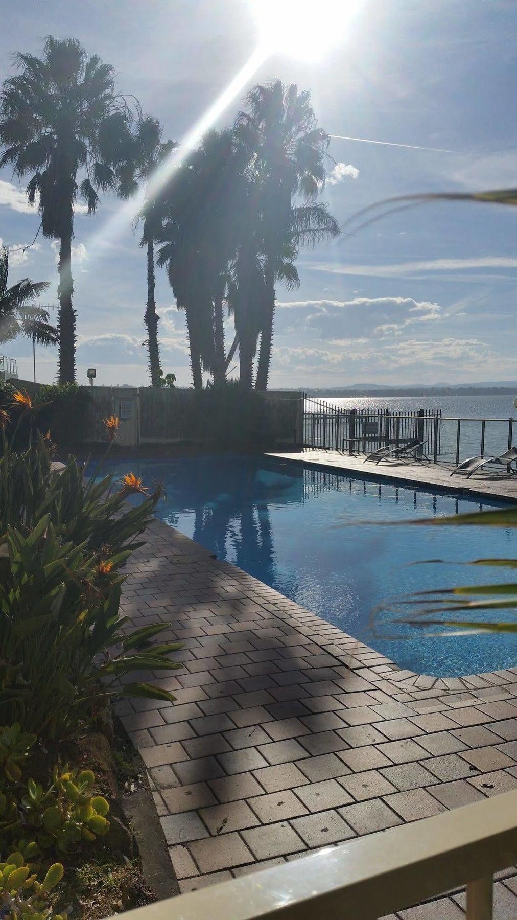 The Beachcomber Hotel & Resort, Ascend Hotel Collection Токли Экстерьер фото View of the pool at the hotel